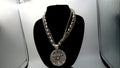 Vintage Avon Nancy and Rise Triple Strand Necklace with Silver tone Filigree Medallion along with Rhinestones.